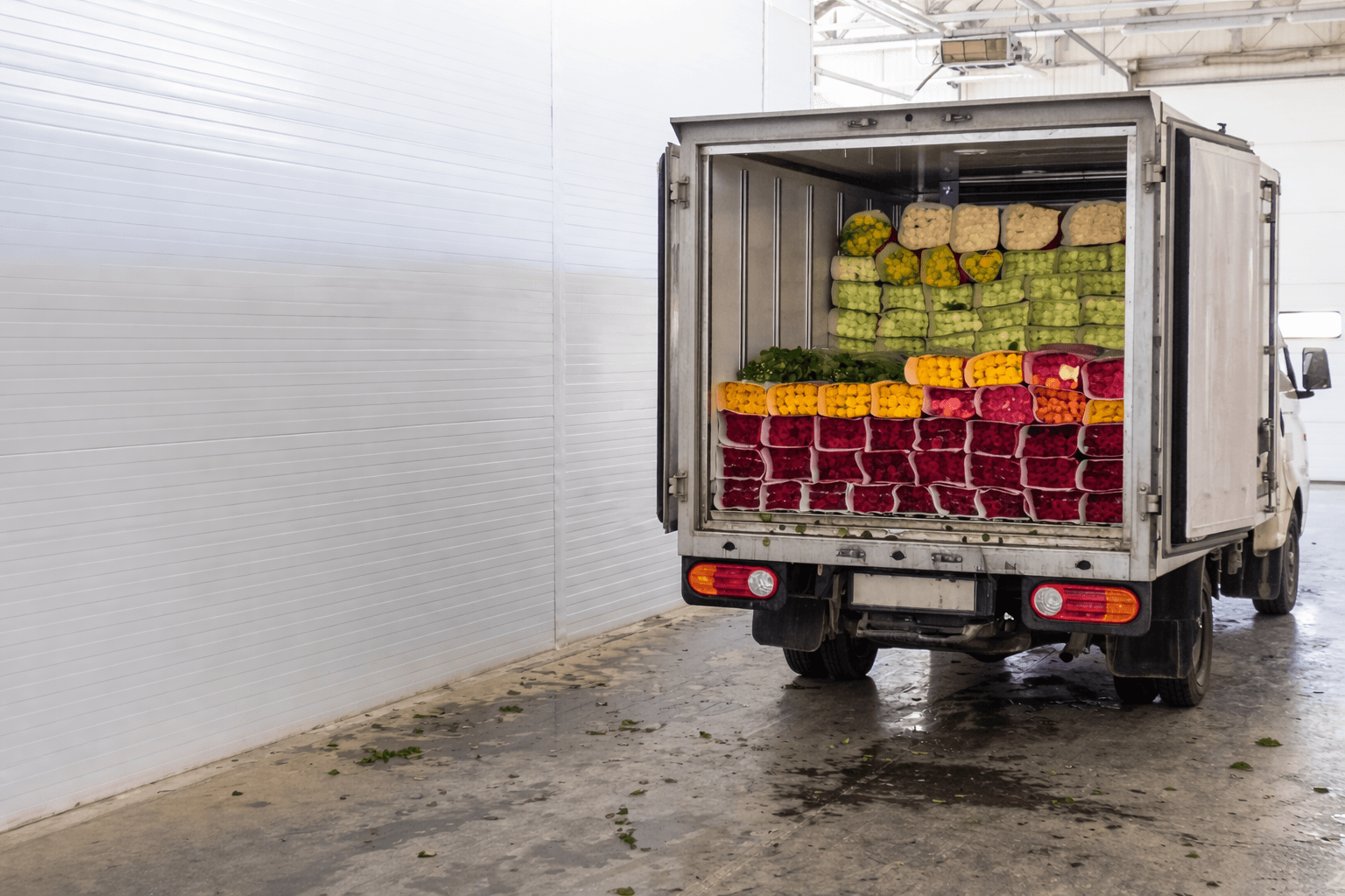 Refrigerated truck loaded with flowers for delivery